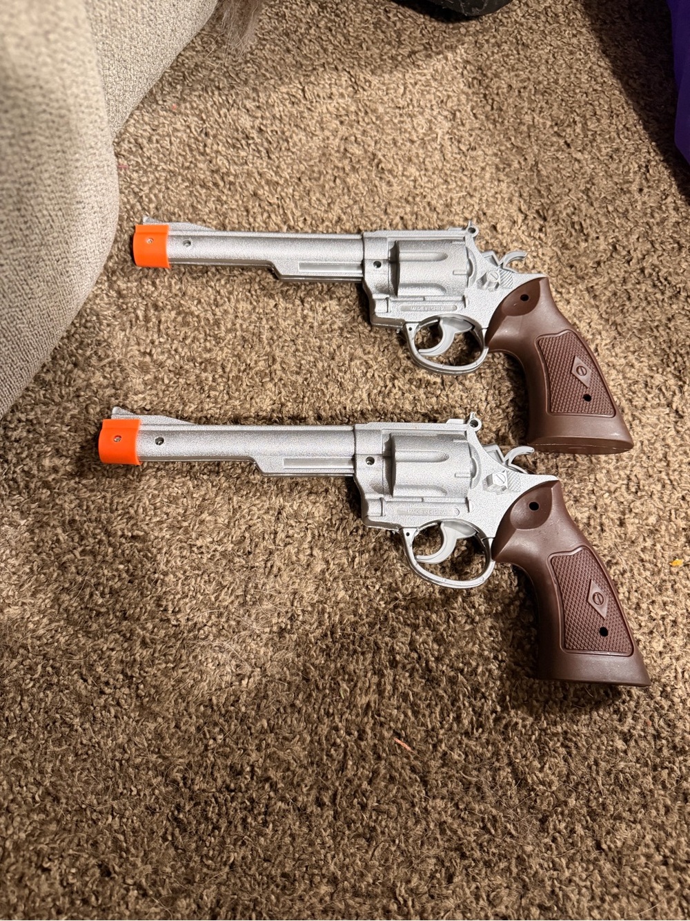 Classic Silver Toy Revolver Pair with Brown Grips and Orange Tips